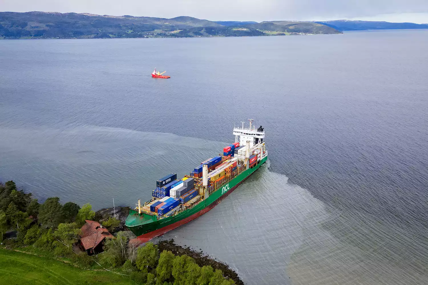 man in norway wakes up to find huge ship has crashed into his backyard it was so unreal